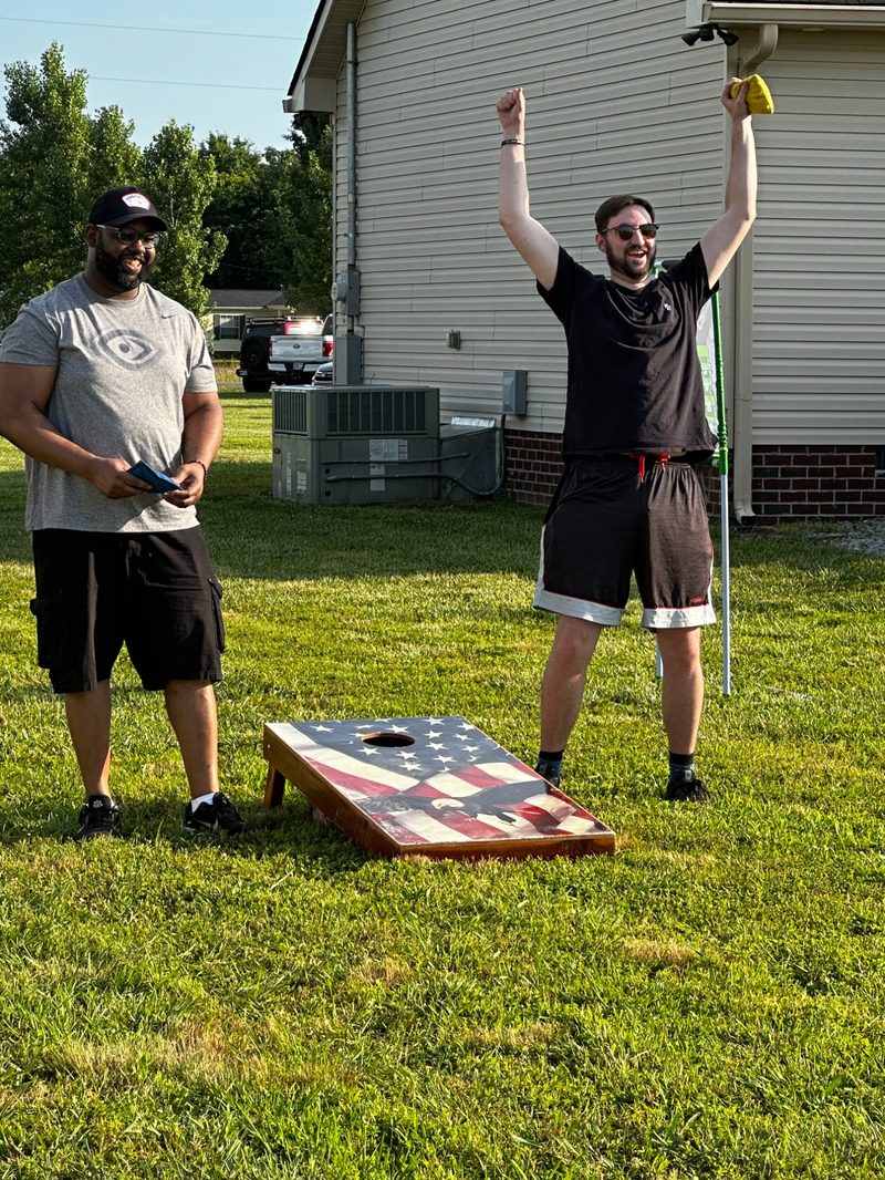 Cornhole celebration on American flag boards